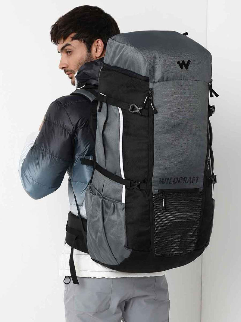 Wildcraft Verge 2 70 L Hiking Rucksack in Light Grey — worn by a model, rear three-quarter view