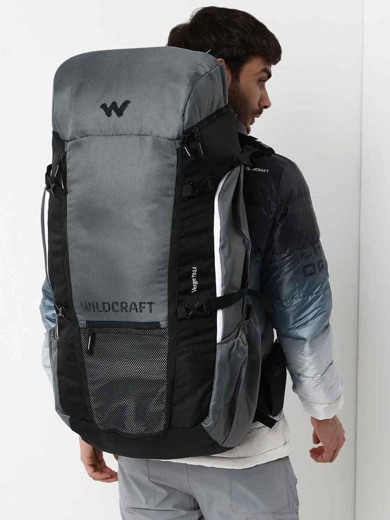 Wildcraft Verge 2 70 L Hiking Rucksack in Light Grey — worn by a model, side view