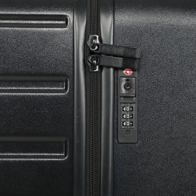 Tommy Hilfiger Hoover X Hardside Trolley Bag in Black — flushed TSA combination lock close-up