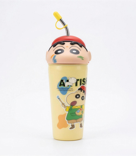 Shinchan kids sipper bottle in pale yellow with a moulded character head lid, red cap and fitted straw